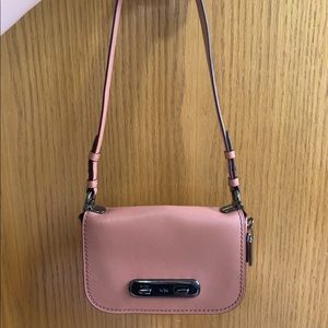 Pink crossbody Coach purse